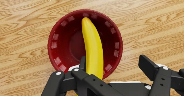 The same moment from the wrist camera: the banana right above the bowl